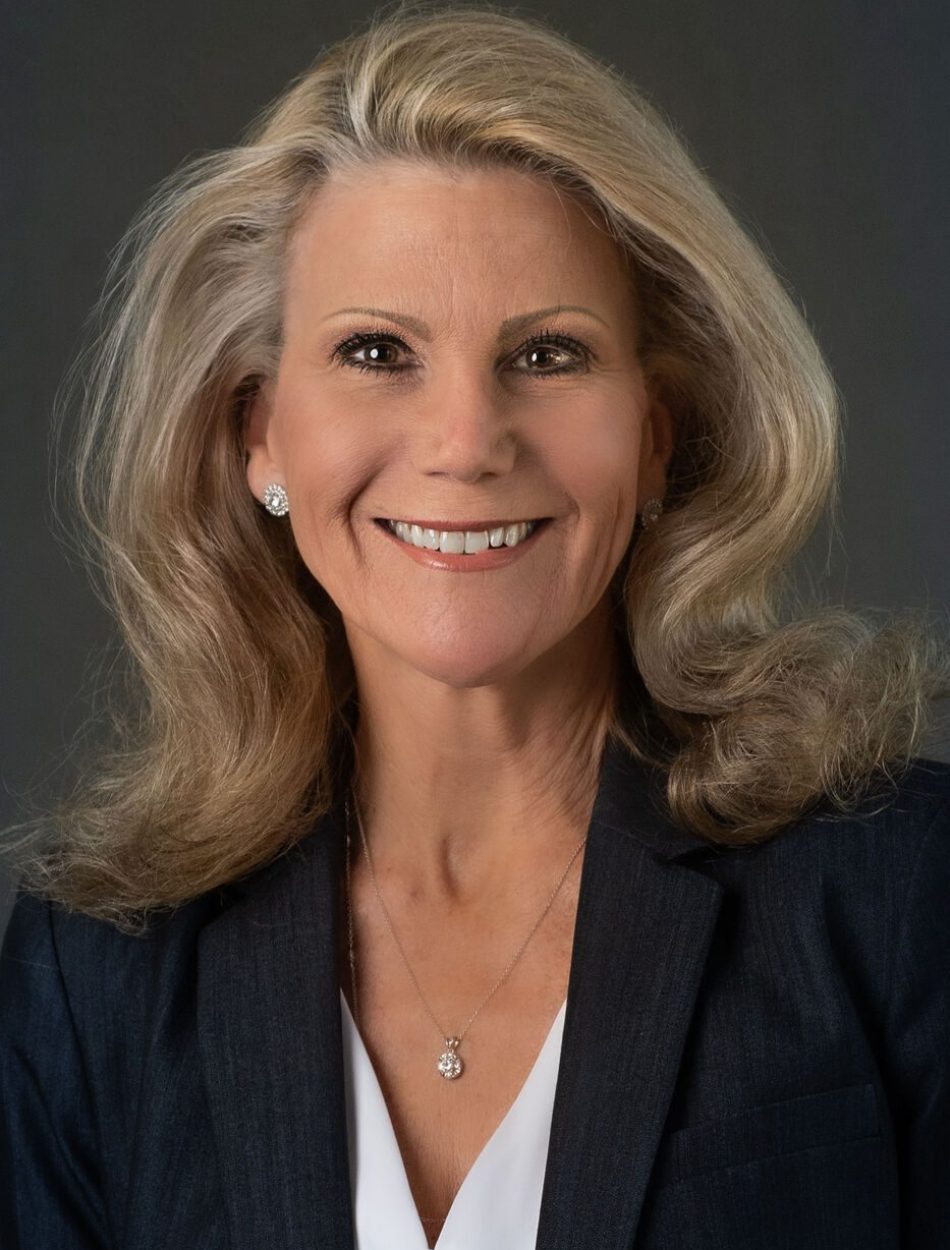 Headshot of a woman in a suit